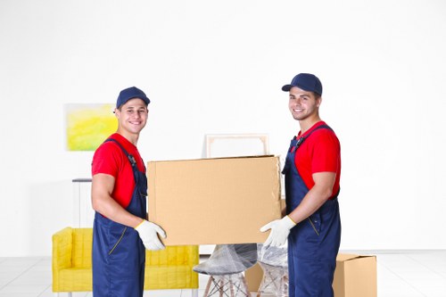 Staff handling storage items safely under Collierrow Storage procedures