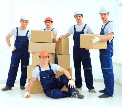Packed boxes and furniture prepared for small removals