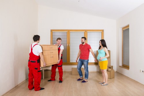 Commercial moving team preparing office removals in Collierrow